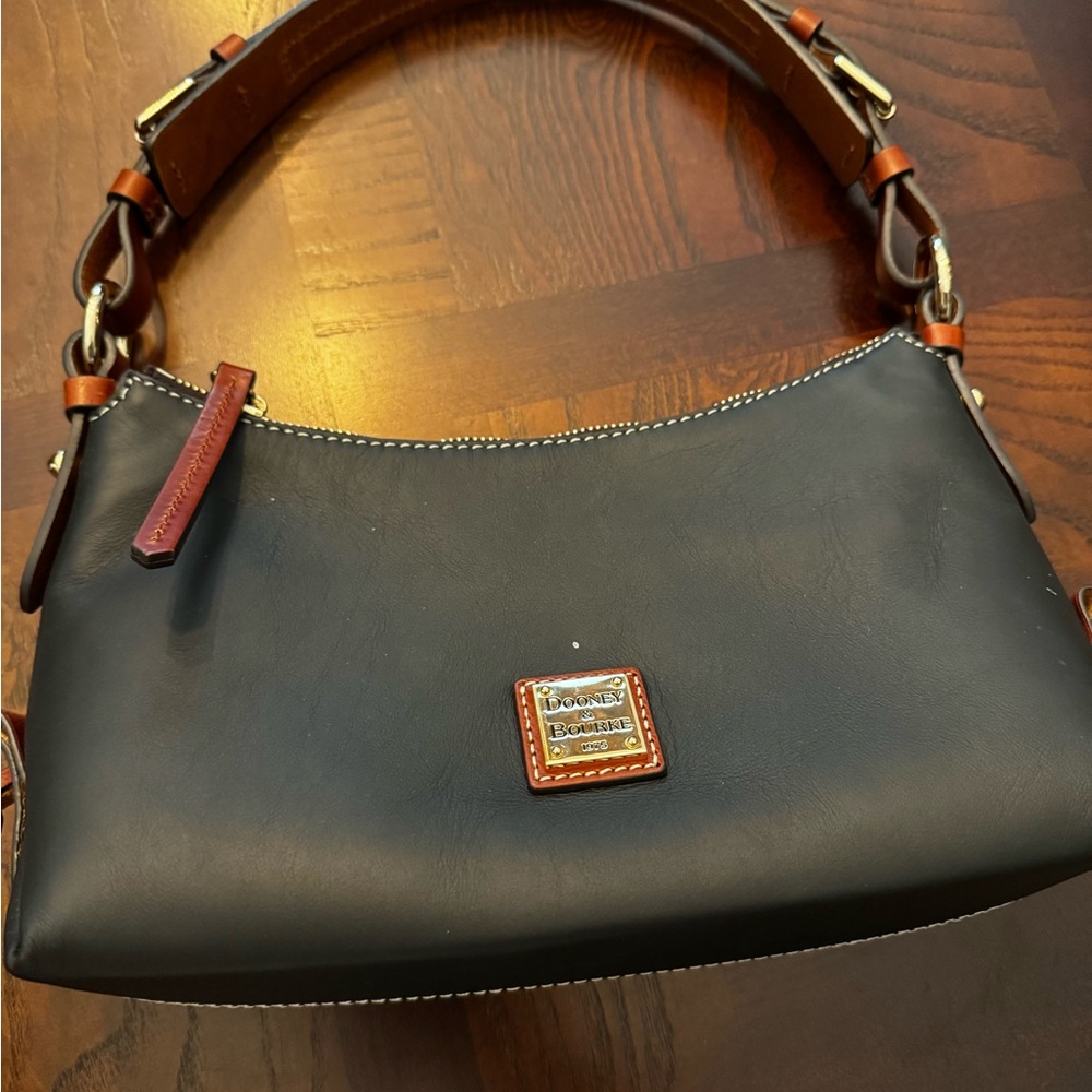 Dooney & Bourke tote, like new no rips, stains, or wear. Small white dot